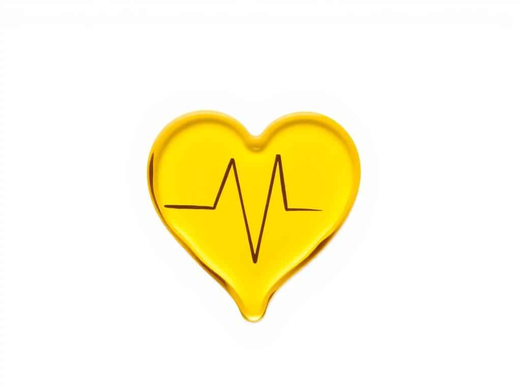 Heart-shaped olive oil drop with a cardiogram line, symbolizing olive oil's benefits for heart health compared to coconut oil